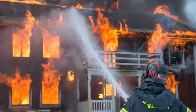 fireman watering fire